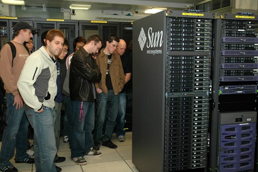 Faculty of Information Technology students touring Monash Sungrid Facility at ITS Division’s main computer room located on Clayton Campus.